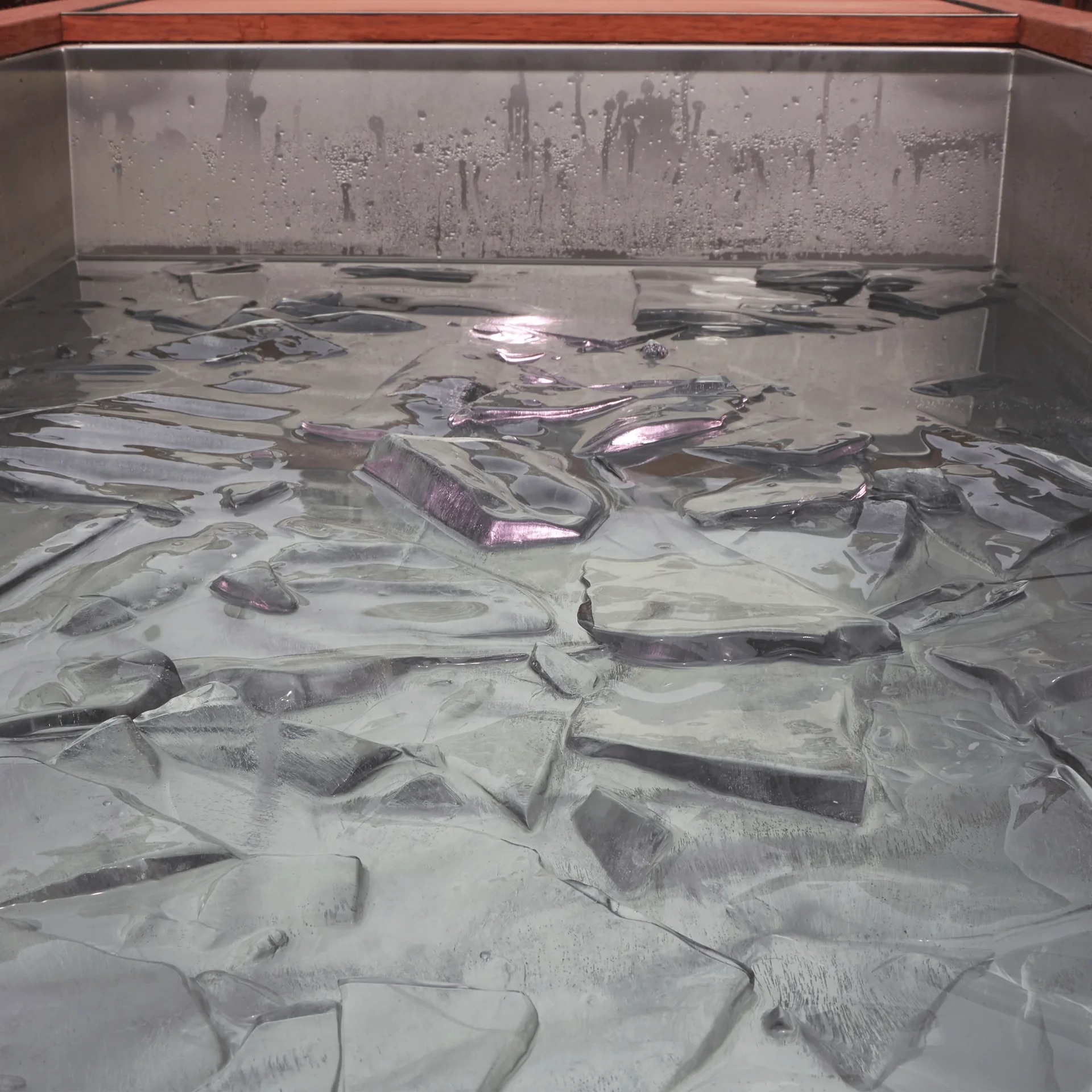 Ice-filled cold plunge interior requiring measured water temperature and controlled exposure policy