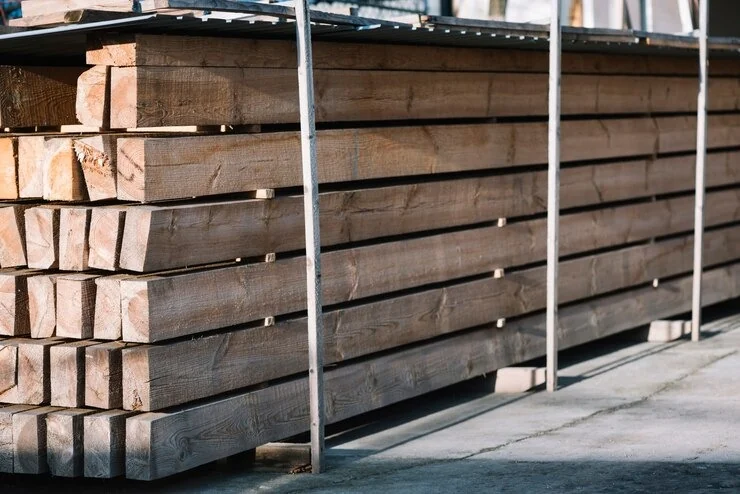 Stacked timber boards prepared for sauna production