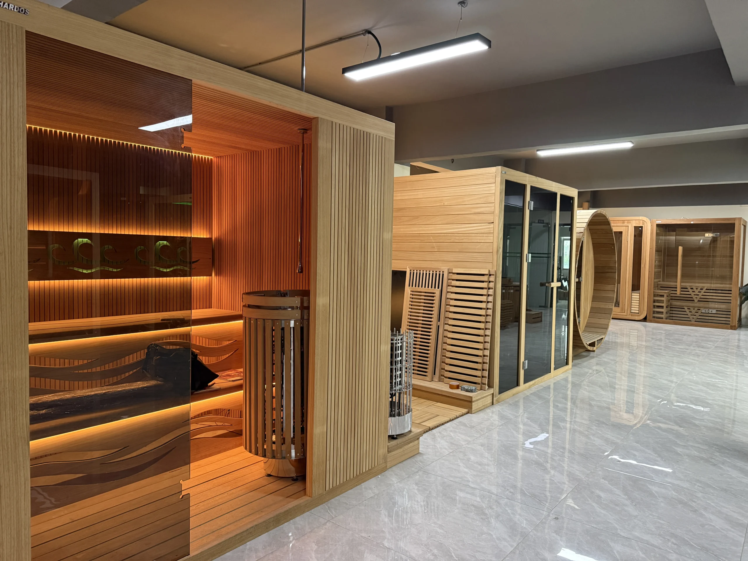 Finished indoor sauna cabins in a retail showroom
