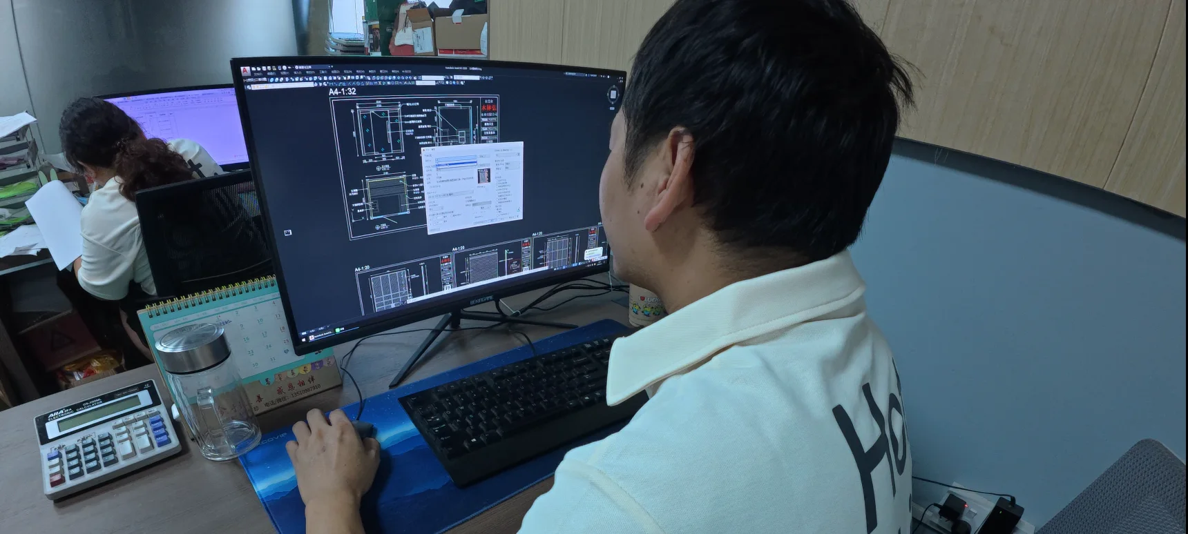 Engineers reviewing sauna product details during development